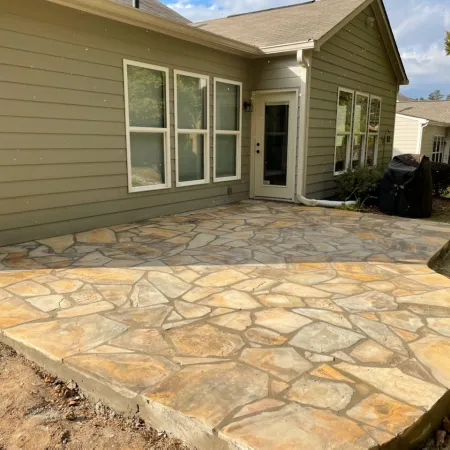 a house with a stone driveway