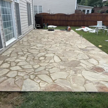 Natural stone patio providing timeless style and functionality