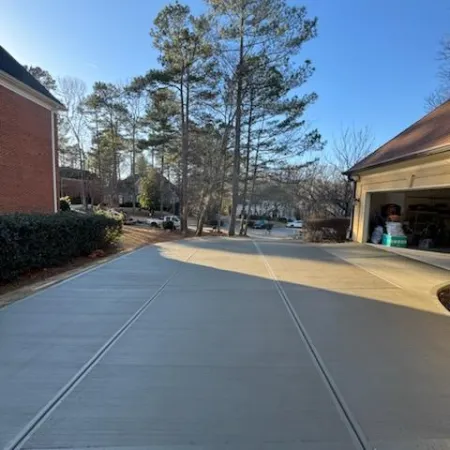 a paved area with trees and buildings