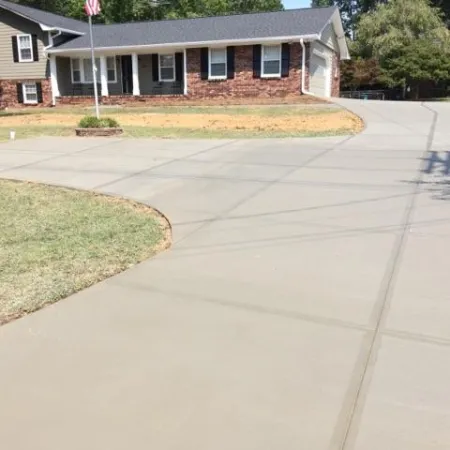 a driveway leading to a house