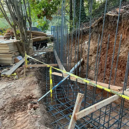 a fenced off area with a metal gate and a metal gate