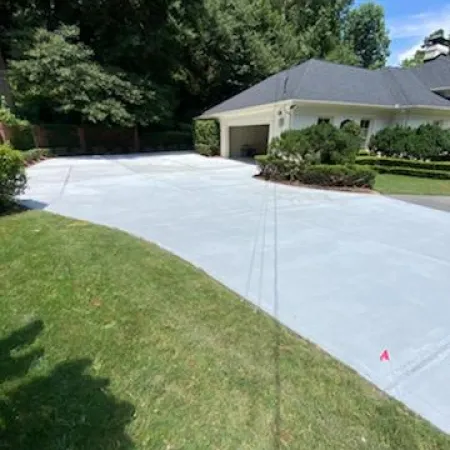 a driveway leading to a house