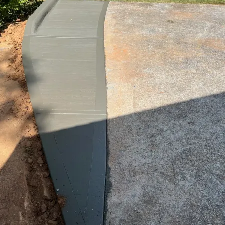 a concrete block on a sidewalk