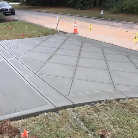 Apron integrated seamlessly into concrete driveway