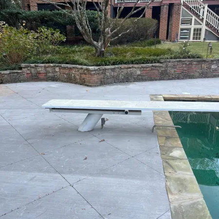 Updated pool deck with refreshed surface for a clean modern design