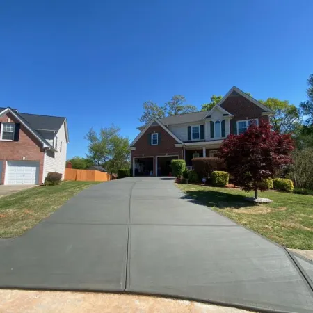 a driveway leading to a house