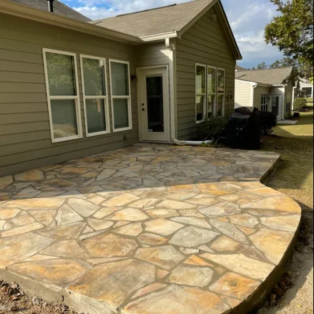 a house with a stone driveway