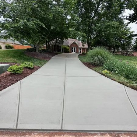 a driveway leading to a house