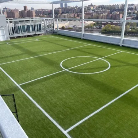 a football field with a fence