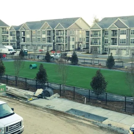 a road with cars and buildings on the side