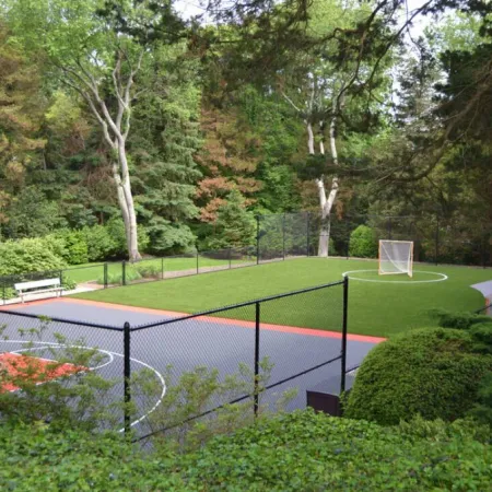 a tennis court in a park