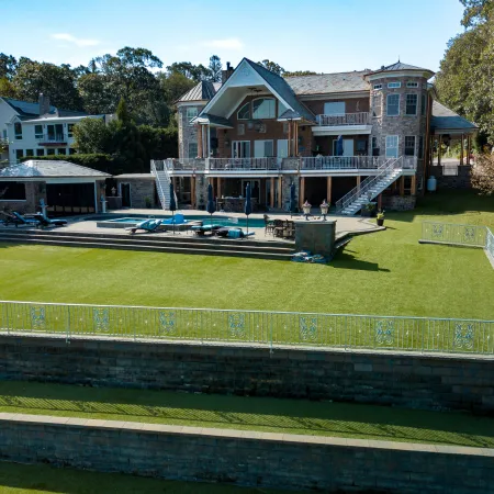 a house with a pool in front