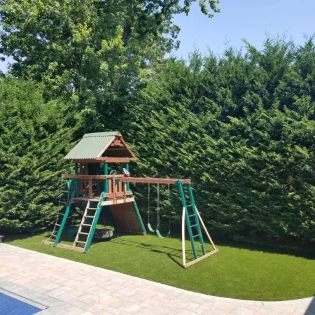 a play structure in a backyard