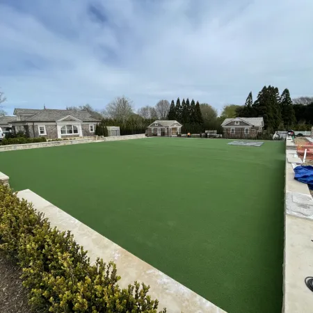 a backyard with a grass lawn