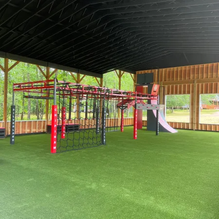 a large green and red playground