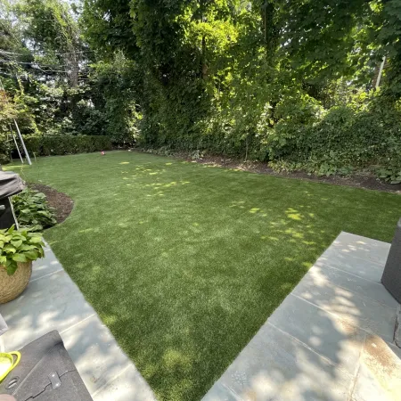 a backyard with a grass yard
