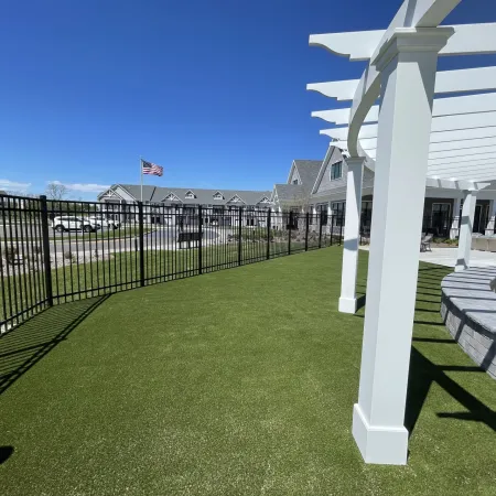 a large white gazebo in a grassy area