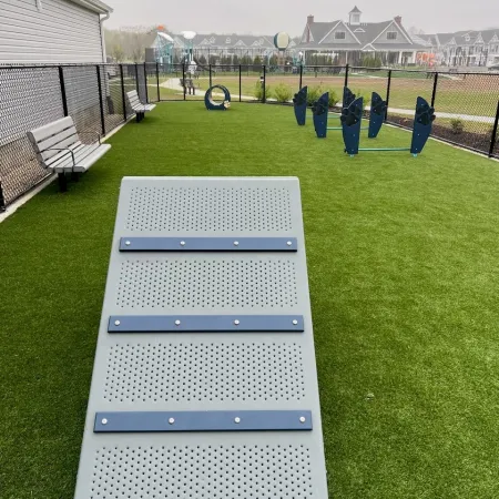 a set of chairs in a grass field
