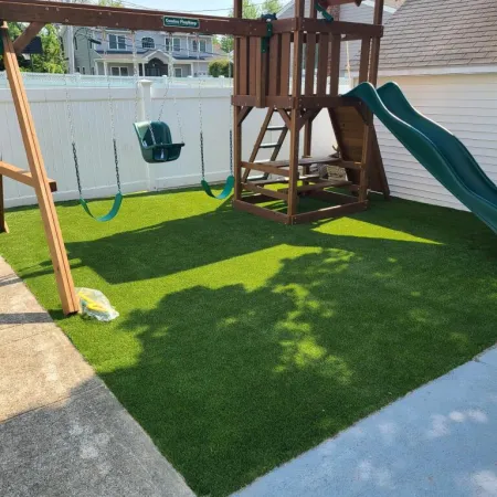 a backyard with a slide and a pool
