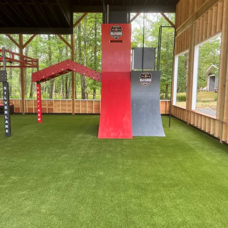 a red pole in a grass field