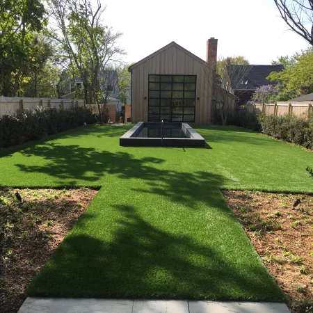 a backyard with a swimming pool