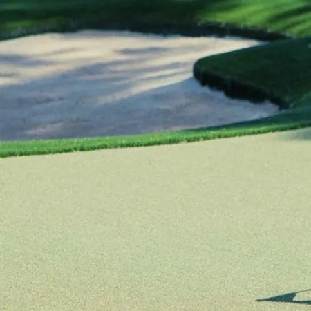 a golf course with a flag