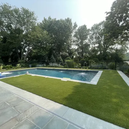a swimming pool in a backyard