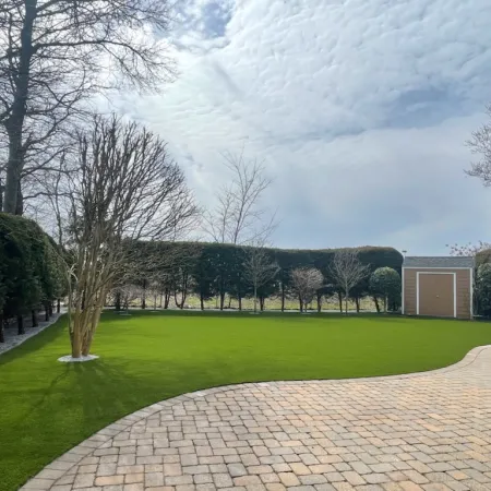 a brick path leading to a building