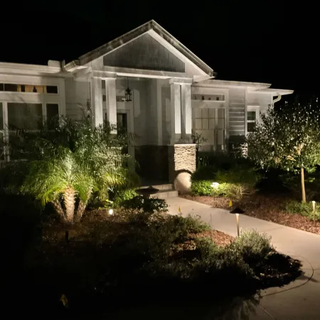 a house with a large front yard with Graceland in the background