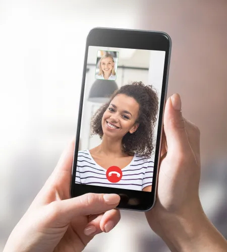 a woman holding a phone