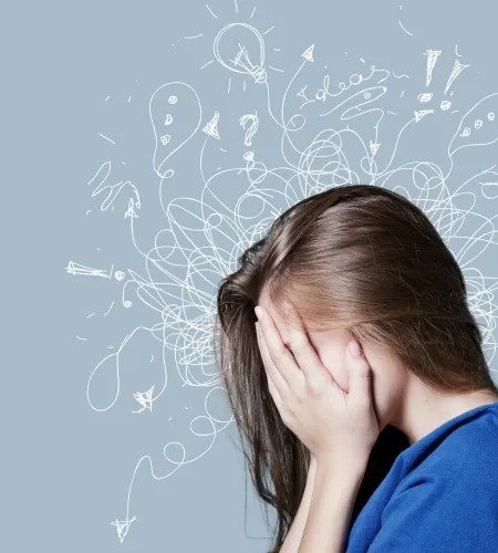 Woman covering face with hands surrounded by chaotic white doodles representing confusion and anxiety.