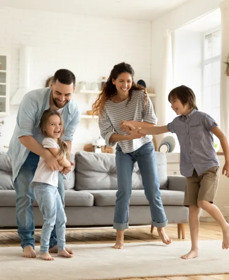 a group of people standing on a couch