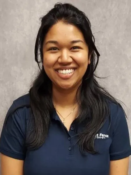 a woman smiling for the camera