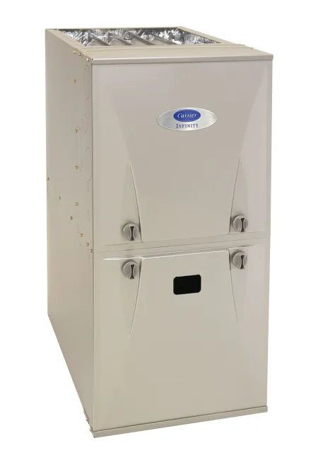 Carrier Infinity beige HVAC furnace unit with vents and control knobs isolated on white background
