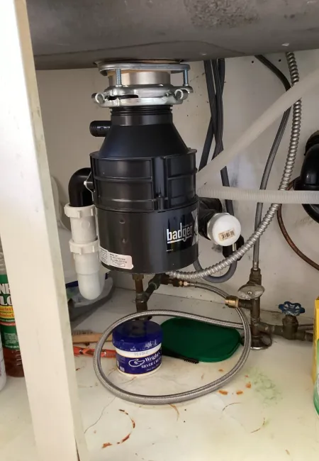 a machine with a blue cap