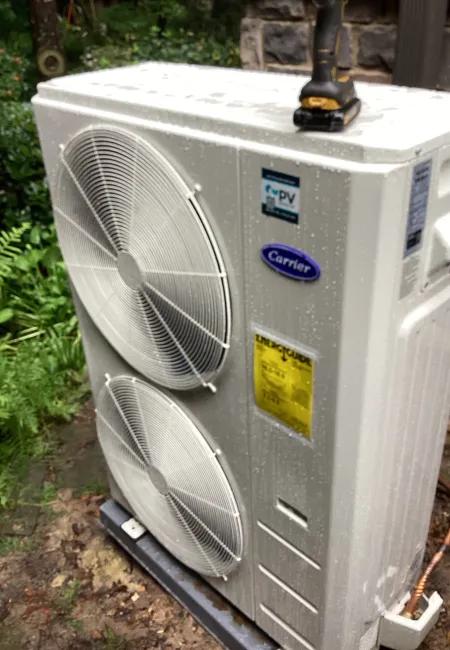 a white and grey carrier ac