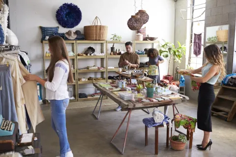 a group of people in a shop
