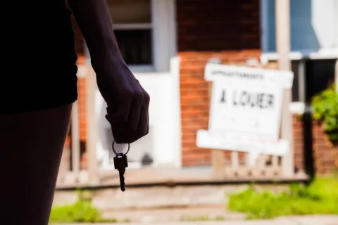 a person holding a key