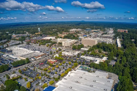 a city with many buildings and trees