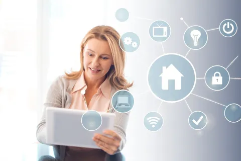 a woman holding a tablet