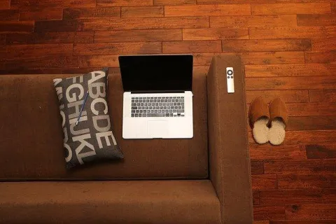 a laptop on a couch