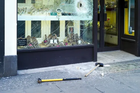 a store front with a broken window