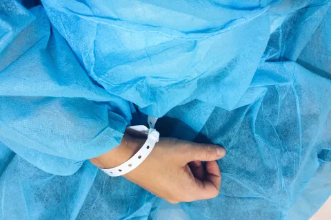 a person with a medical bracelet