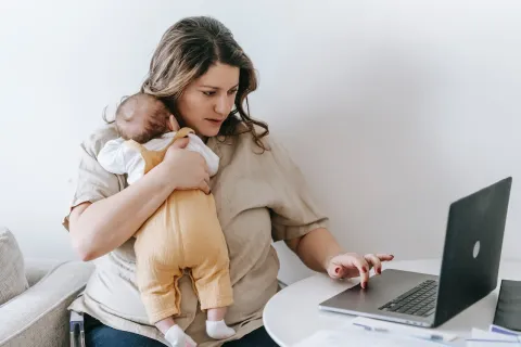 a person holding a baby