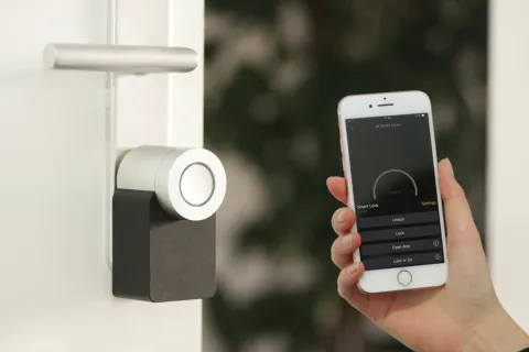 a phone unlocking a door