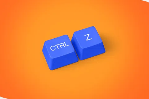 Blue keyboard keys labeled CTRL and Z on an orange background, symbolizing the undo command.