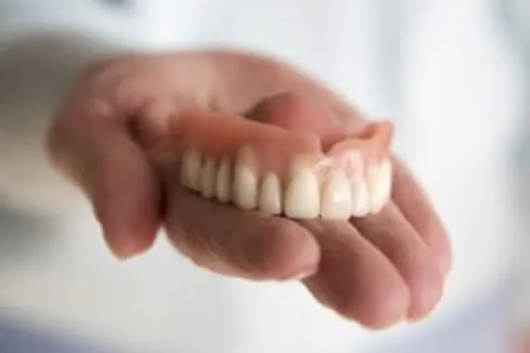 Replace Dentures with Full Mouth Dental Implants
