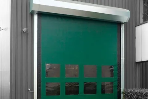 a green door with a light on top