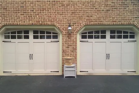 a brick building with white doors