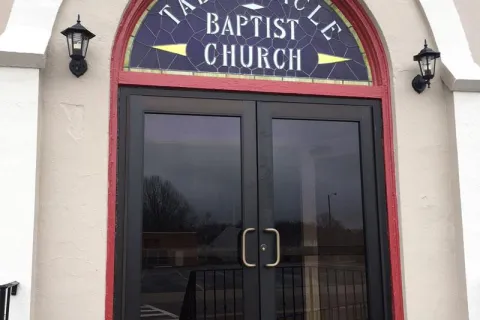 a building with a sign above the door